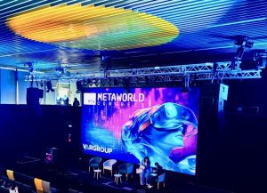 Escenario auditorio con cartel Metaworld Congres 25 